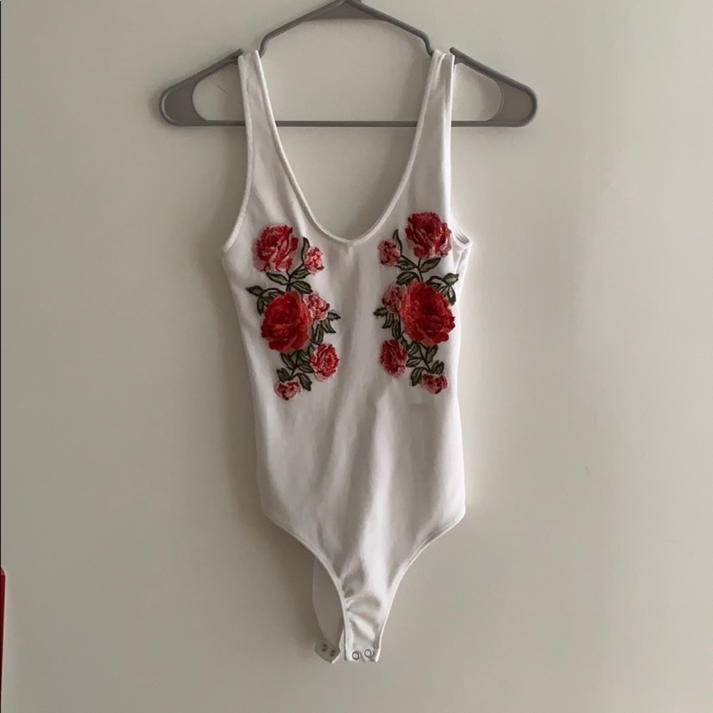 - Floral bodysuit